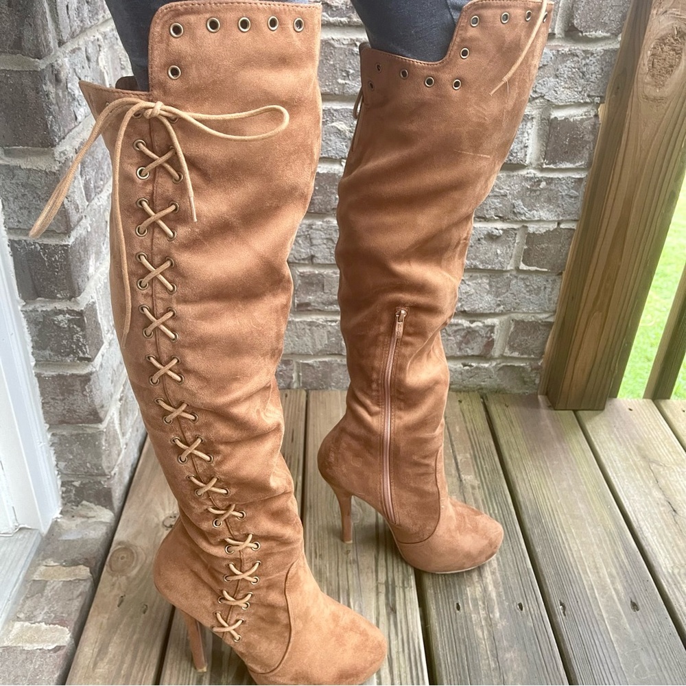 Brown suede knee-high boots with high heel